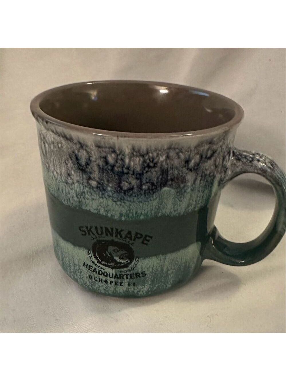 Skunk Ape Headquarters Ceramic Mug Brown Folklore Cryptid Theme